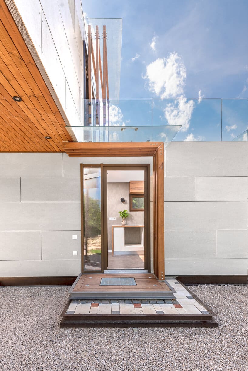 Residential façade project — glass entrance detail